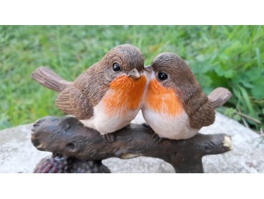 Ptáčci na větvi se žaludy